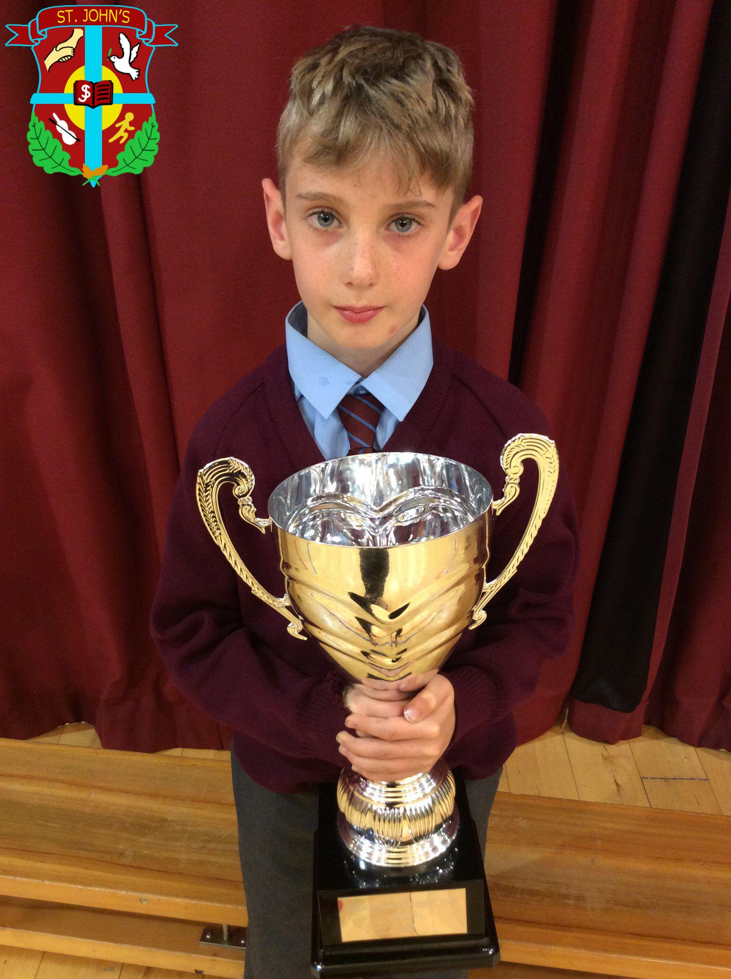 Well done Adam who received the team trophy in a recent football match. You’re a star!
