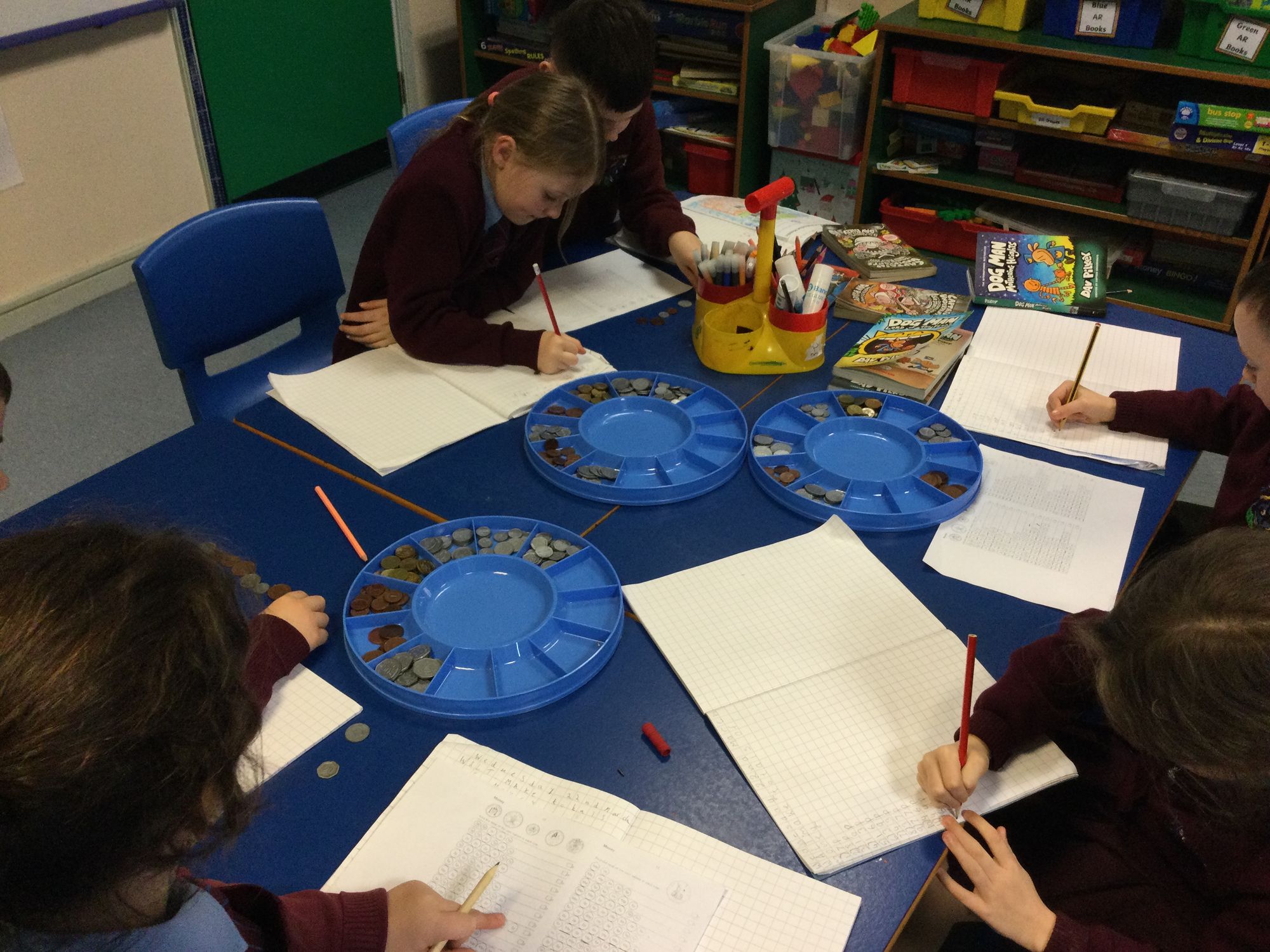 Year 4 enjoying adding our money and working in pairs.