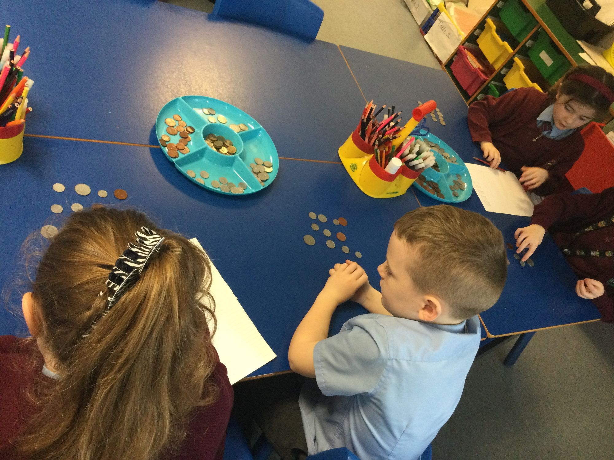 Year 4 making totals and buying items with money.