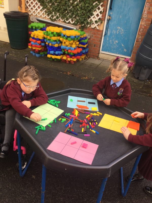Year 1a enjoying learning outdoors.