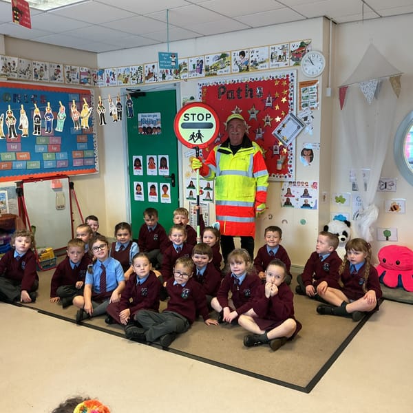 Year 2 had a visit from Martin, our Lollipop Man.
